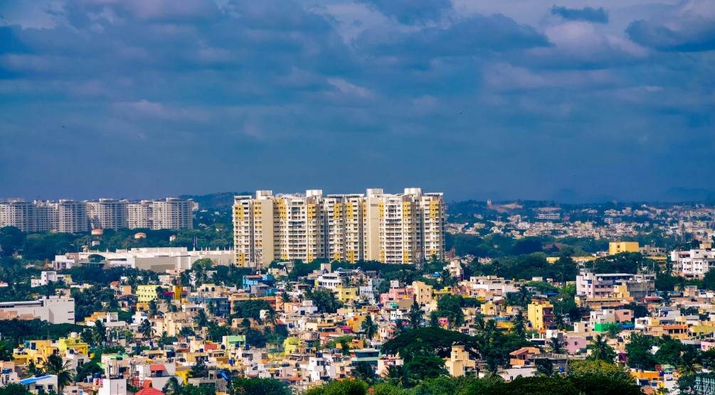 Aerial view of Madhavaram during the day, showcasing a residential neighbourhood with numerous houses obviously illustrating real estate growth in Madhavaram.