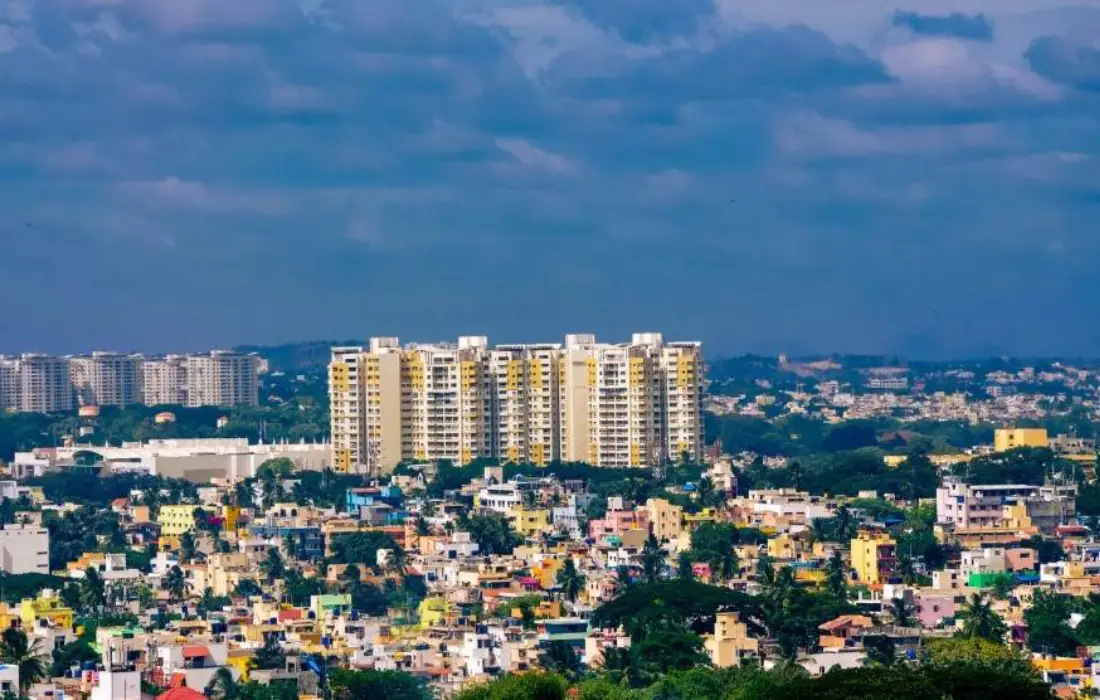 Aerial view of Madhavaram during the day, showcasing a residential neighbourhood with numerous houses obviously illustrating real estate growth in Madhavaram.